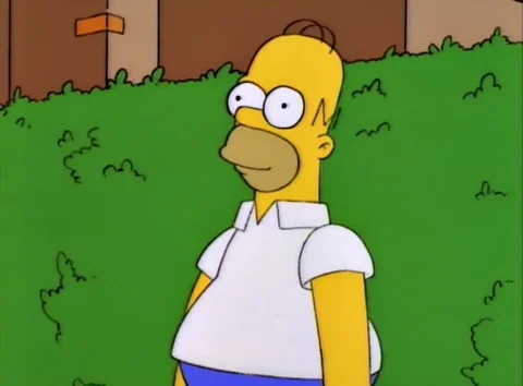 A gif of Homer Simpson stepping backward into a large green hedge until he can no longer be seen.
